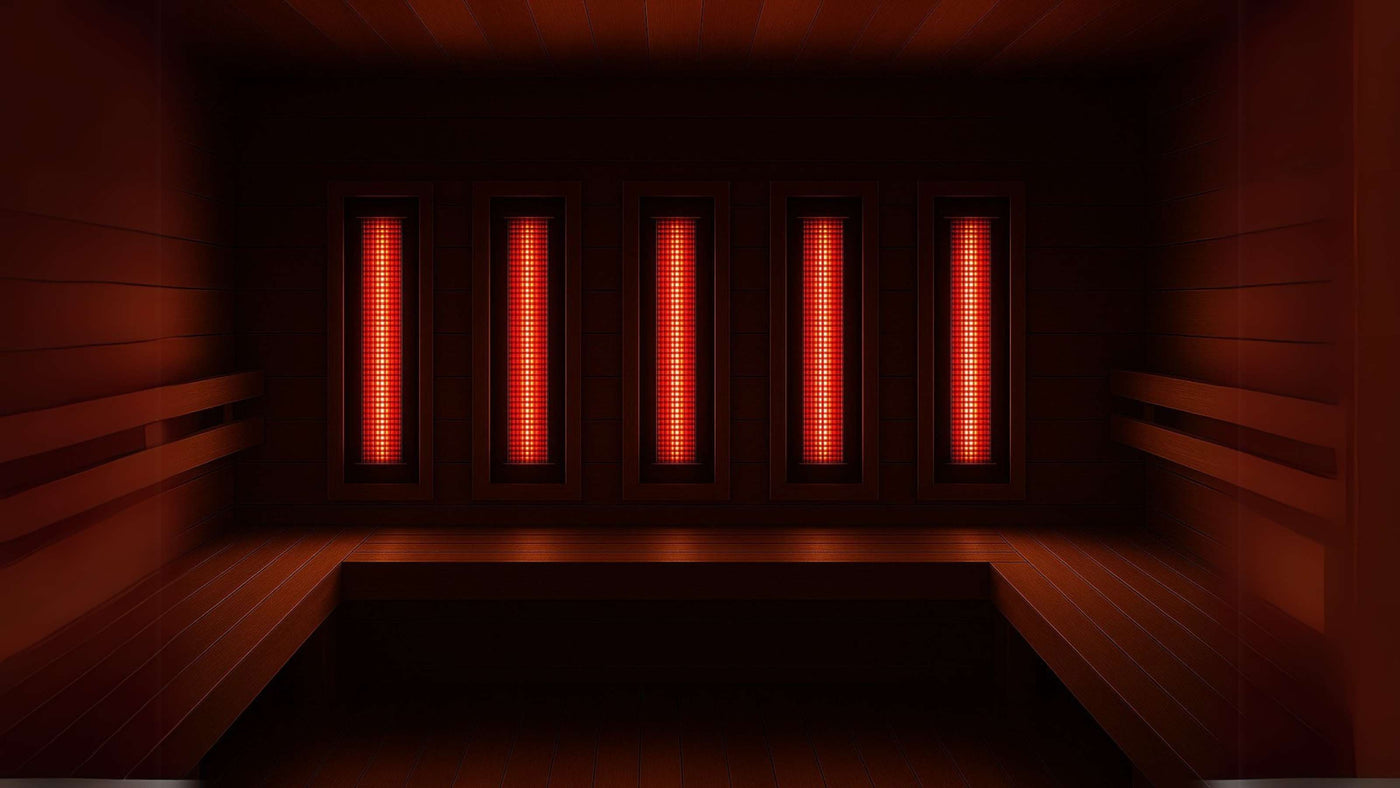 infrared sauna interior with red glowing heaters and bench, symbolizing recovery tools and wellness routines